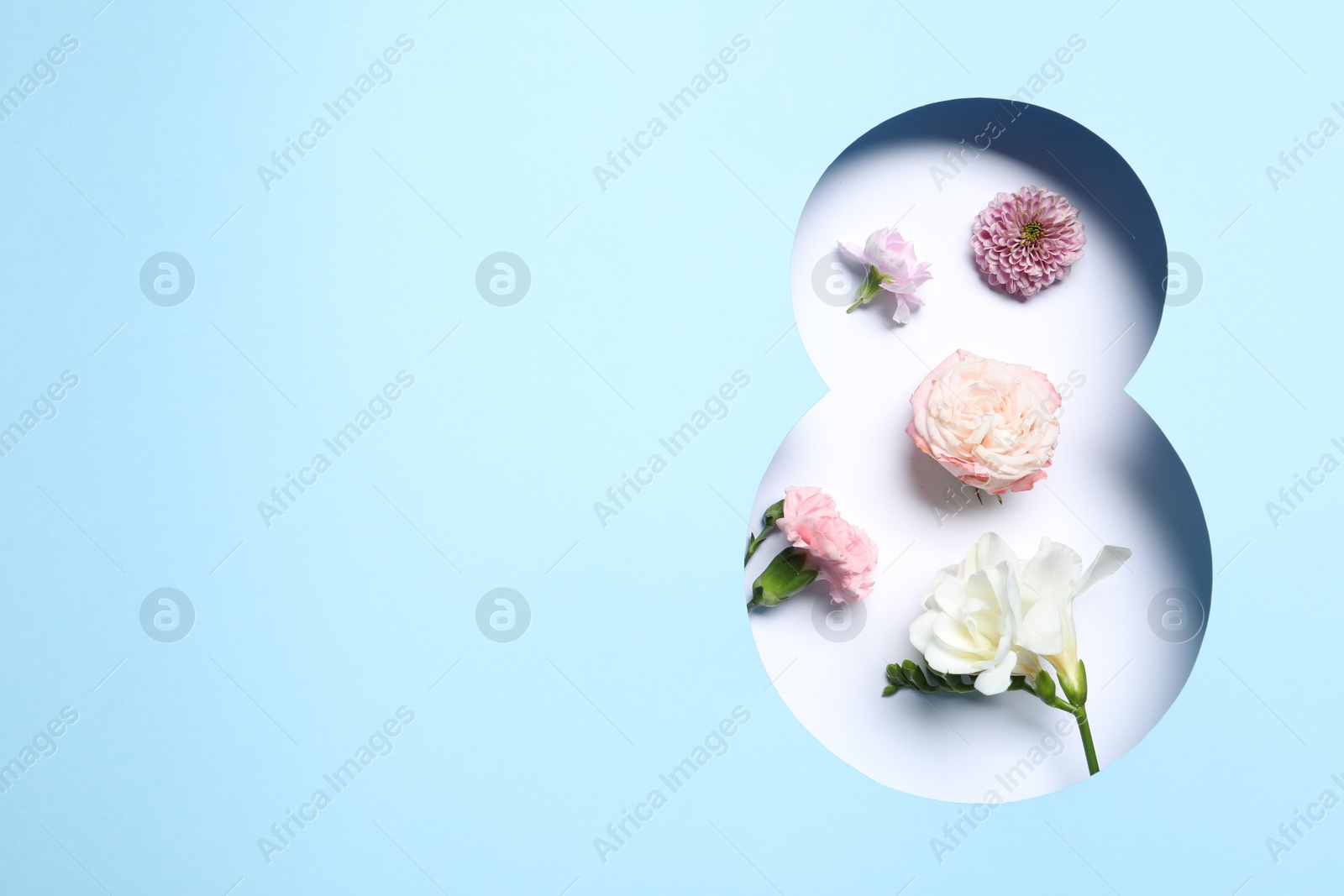 Photo of 8 March greeting card design with different flowers and space for text, top view. Happy International Women's Day