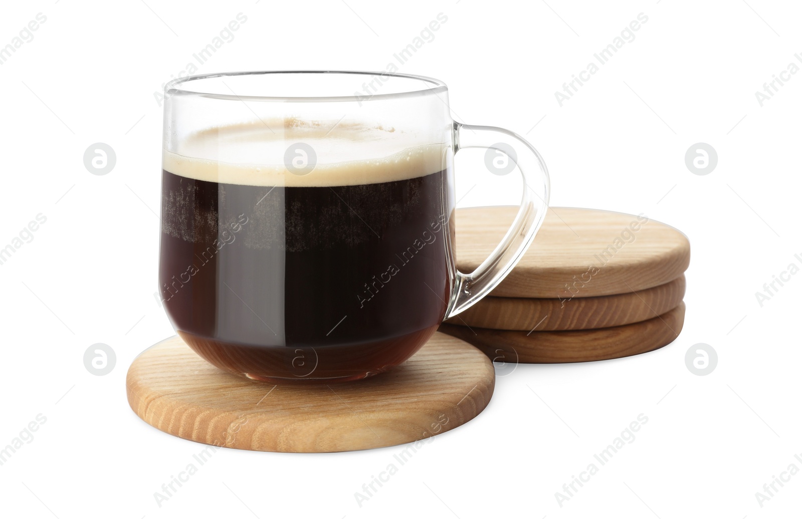 Photo of Glass mug of coffee and stylish wooden cup coasters on white background