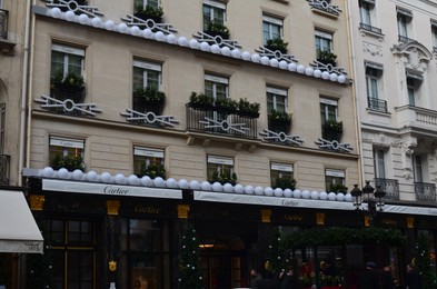 Paris, France - December 10, 2022: Cartier store exterior with Christmas decor