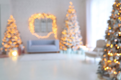 Photo of Blurred view of Christmas living room interior