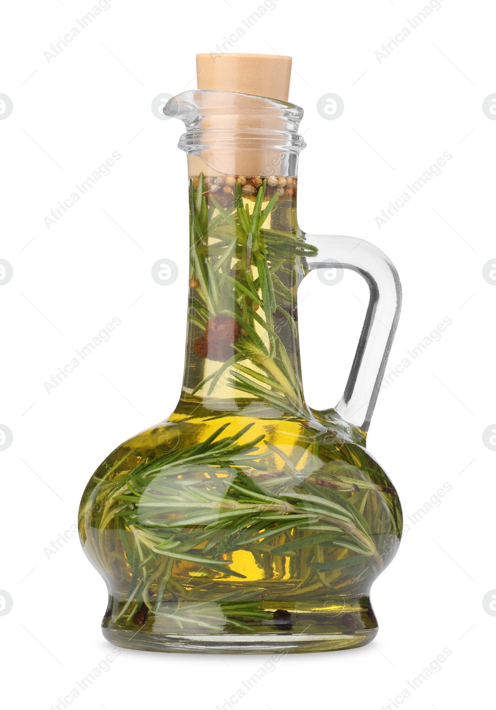 Photo of Glass jug of cooking oil with spices and herbs isolated on white