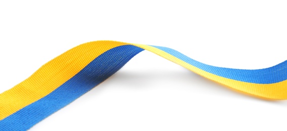 Photo of Ribbon with colors of national Ukrainian flag isolated on white