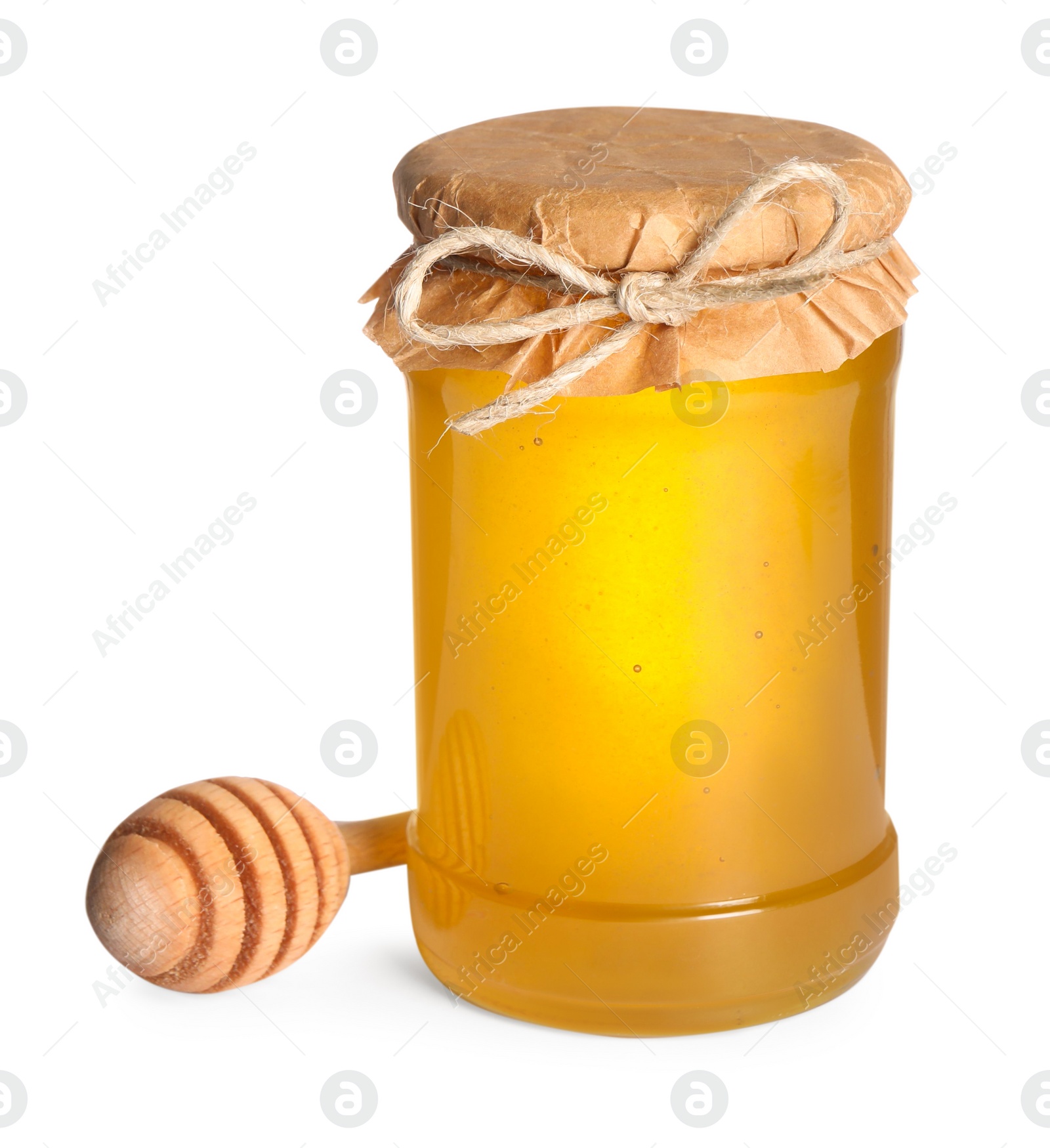 Photo of Tasty natural honey in glass jar and dipper isolated on white