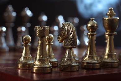 Photo of Chess pieces on checkerboard before game, selective focus
