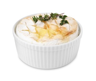 Tasty baked camembert and thyme in bowl isolated on white