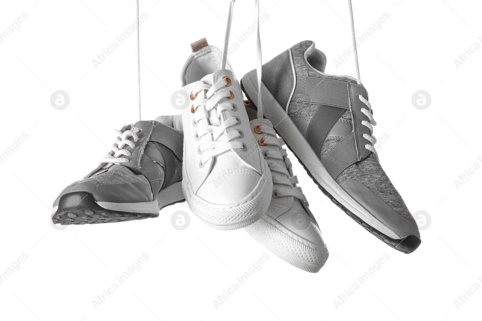 Photo of Different shoes on white background