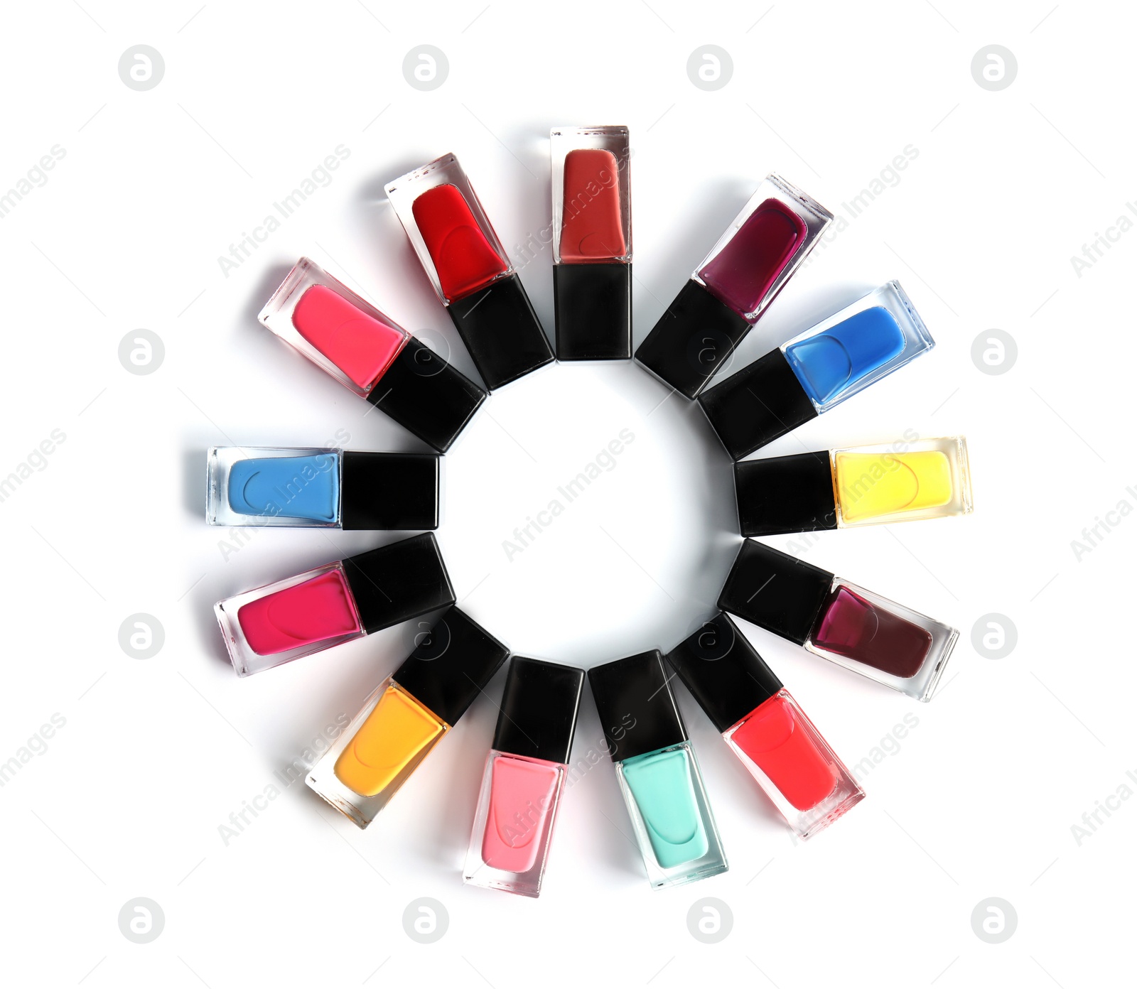 Photo of Frame made of nail polishes on white background, top view with space for text