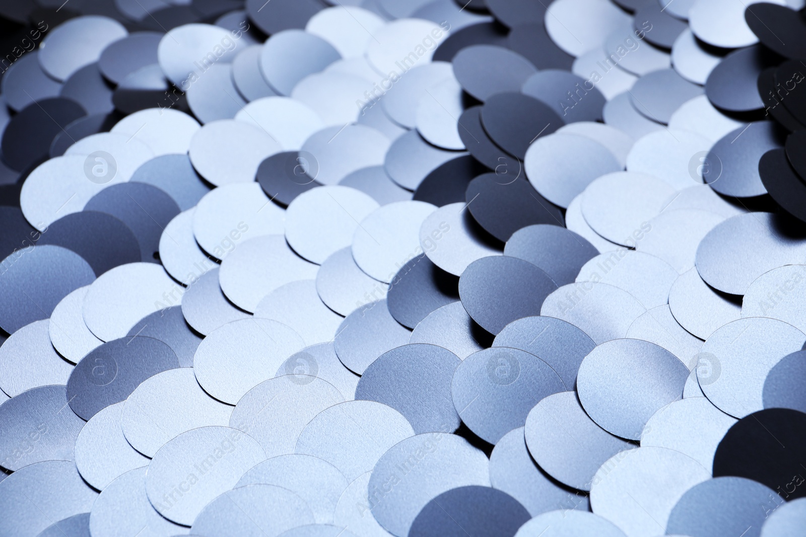 Photo of Texture of beautiful shiny sequins as background, closeup