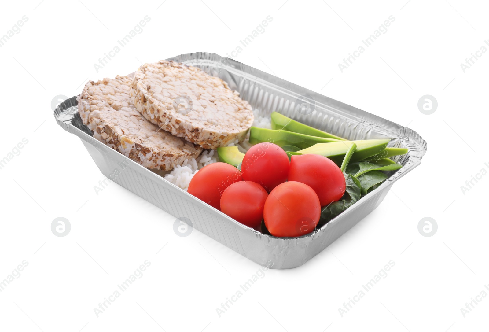 Photo of Container with rice, puffed cakes, fresh tomato, avocado and spinach isolated on white