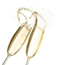 Image of Clinking glasses of sparkling wine with splash on white background