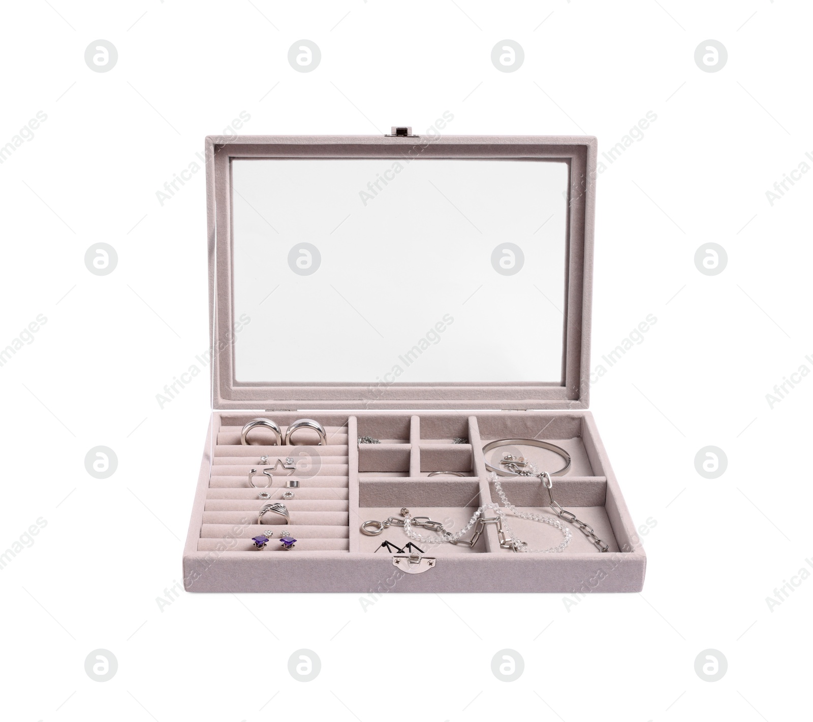 Photo of Jewelry box with many different silver accessories isolated on white