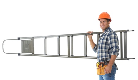 Professional builder carrying metal ladder on white background