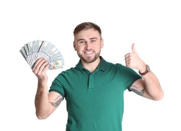 Photo of Portrait of young man holding money banknotes on white background