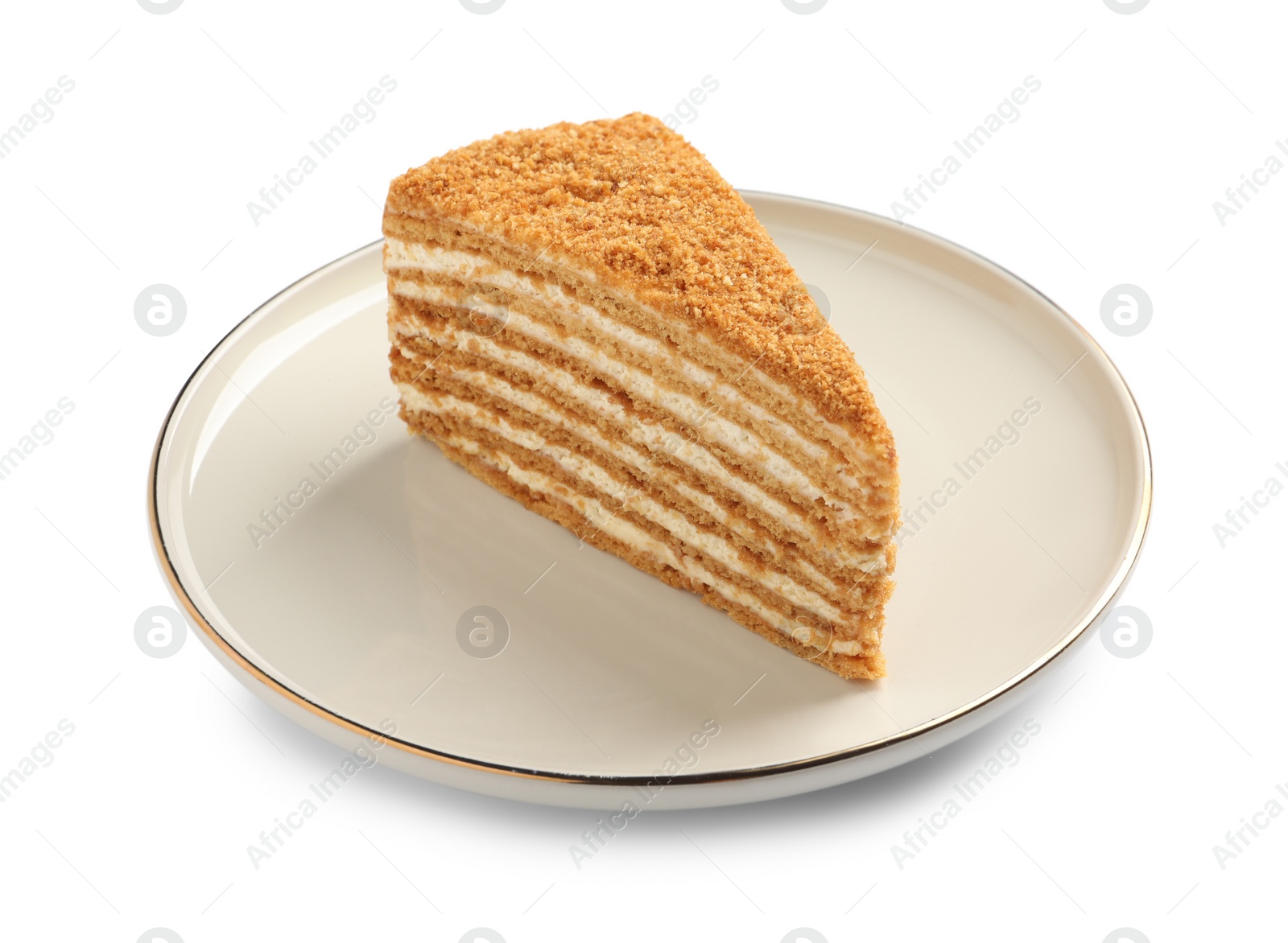 Photo of Slice of delicious honey cake isolated on white