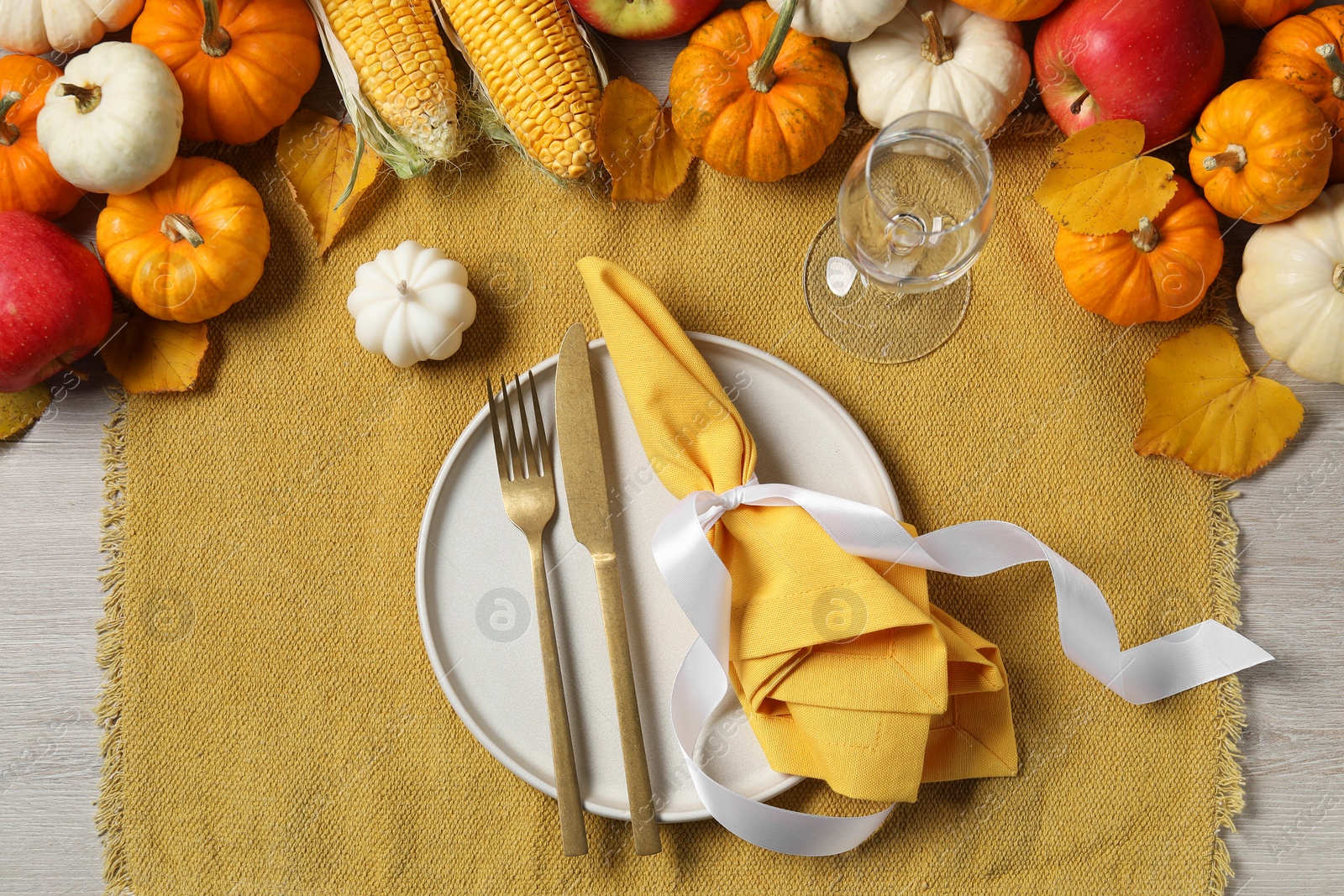 Photo of Happy Thanksgiving day. Beautiful table setting and autumn decoration, flat lay