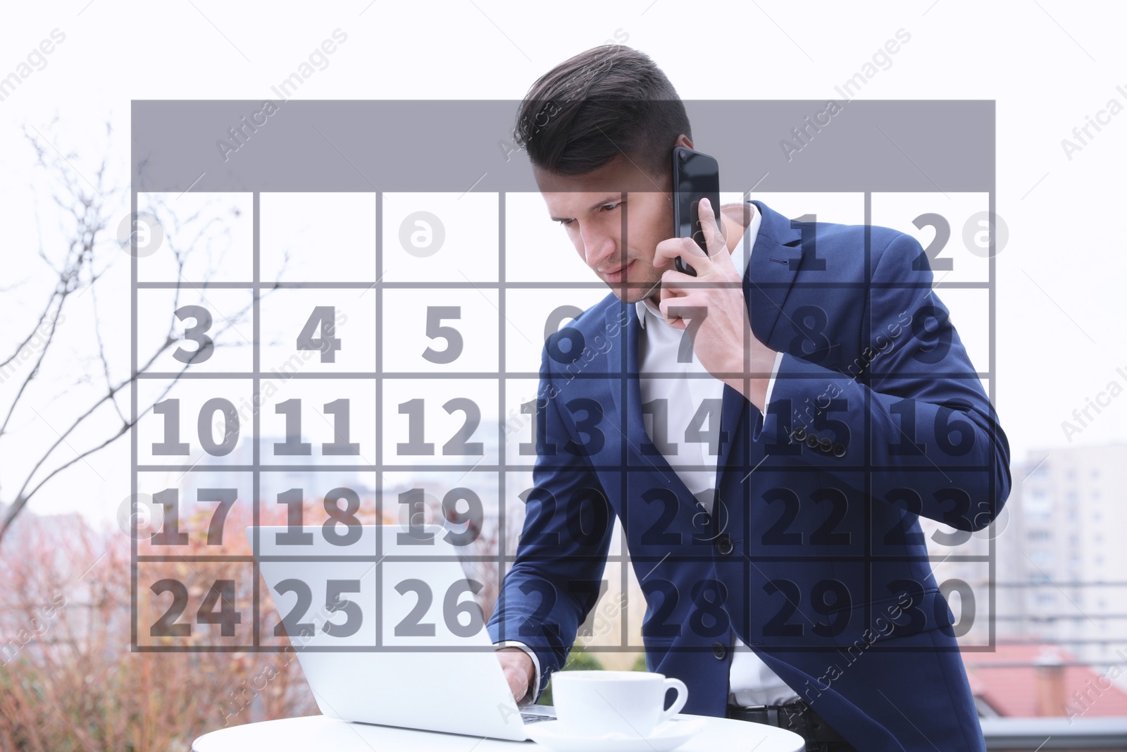 Image of Calendar and man working with laptop in outdoor cafe