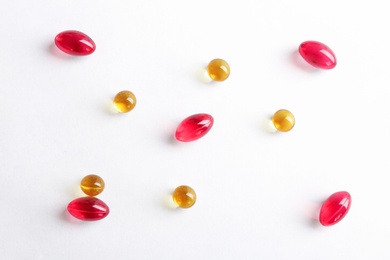 Photo of Different pills on white background