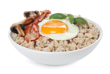 Tasty boiled oatmeal with fried egg, mushrooms and bacon isolated on white