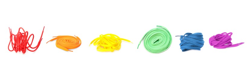 Image of Set with different bright shoe laces on white background. Banner design