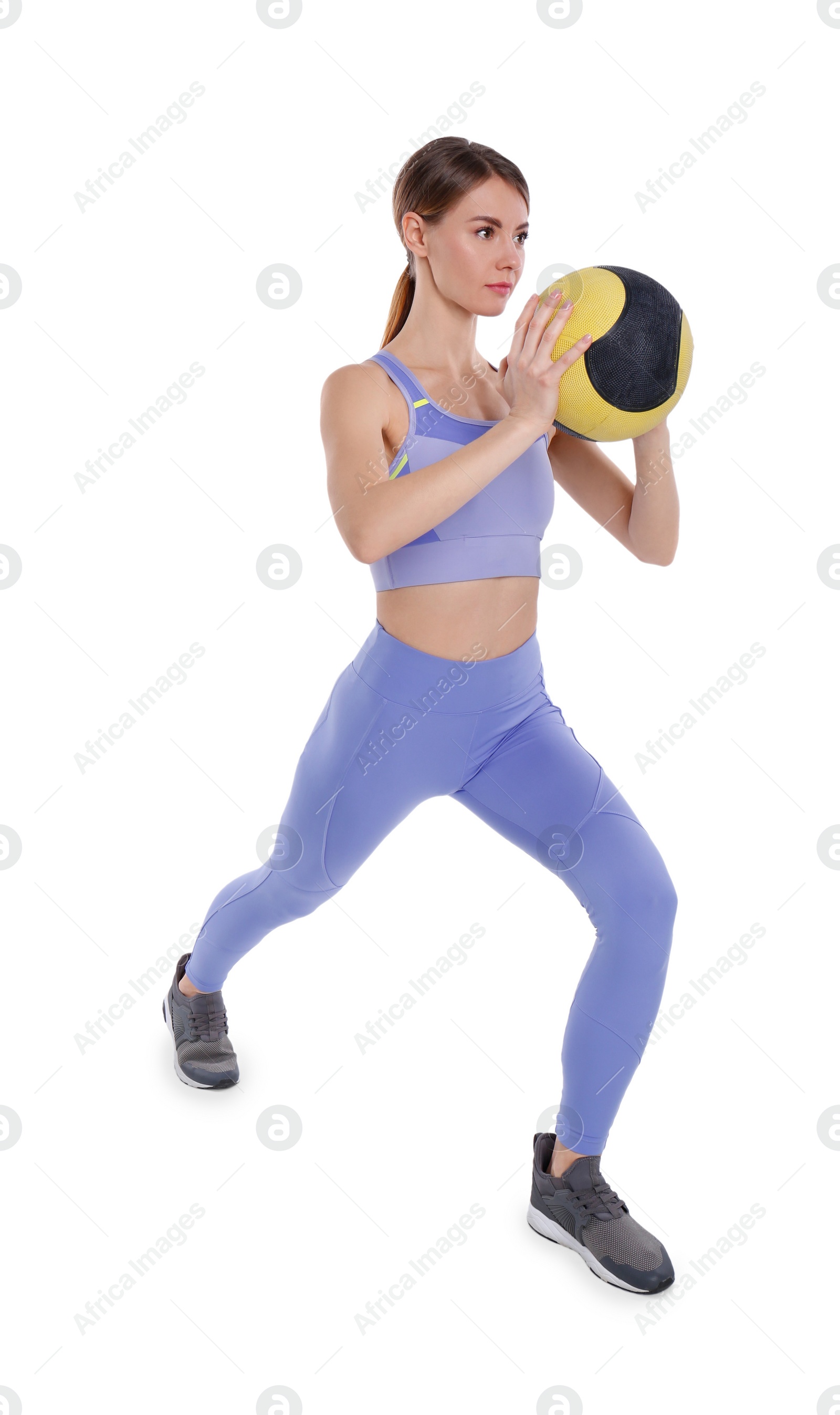 Photo of Athletic woman doing exercise with medicine ball isolated on white