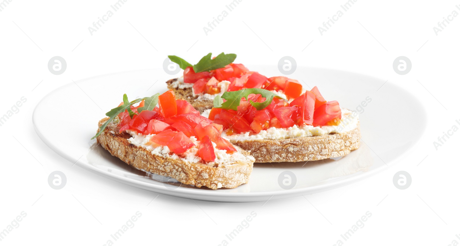 Photo of Plate of delicious tomato bruschettas on white background