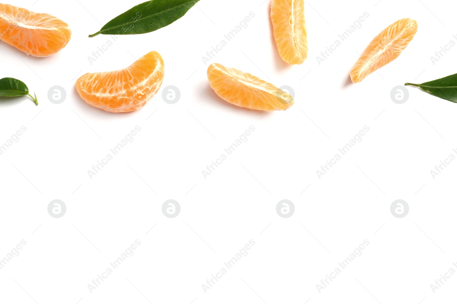 Photo of Composition with tangerine segments and leaves on white background, top view. Space for text