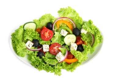 Tasty fresh Greek salad on white background, top view