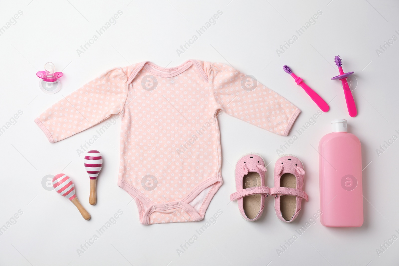 Photo of Flat lay composition with baby clothes and accessories on white background