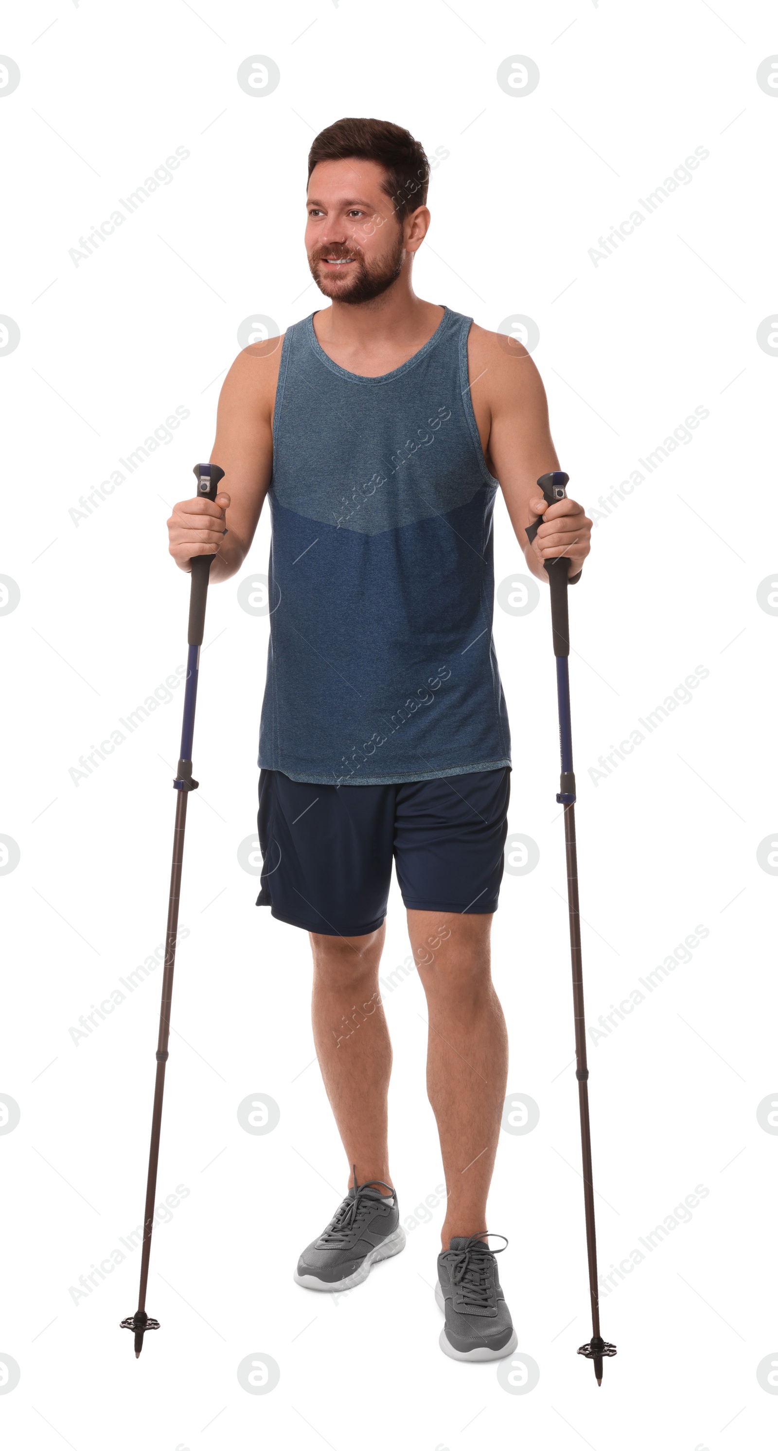 Photo of Man practicing Nordic walking with poles isolated on white