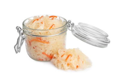 Photo of Glass jar of tasty fermented cabbage with carrot on white background