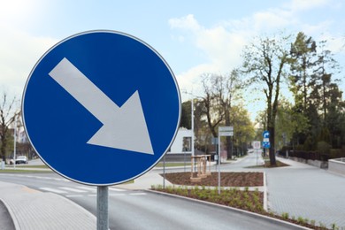 Traffic sign Keep Right on city street, closeup. Space for text