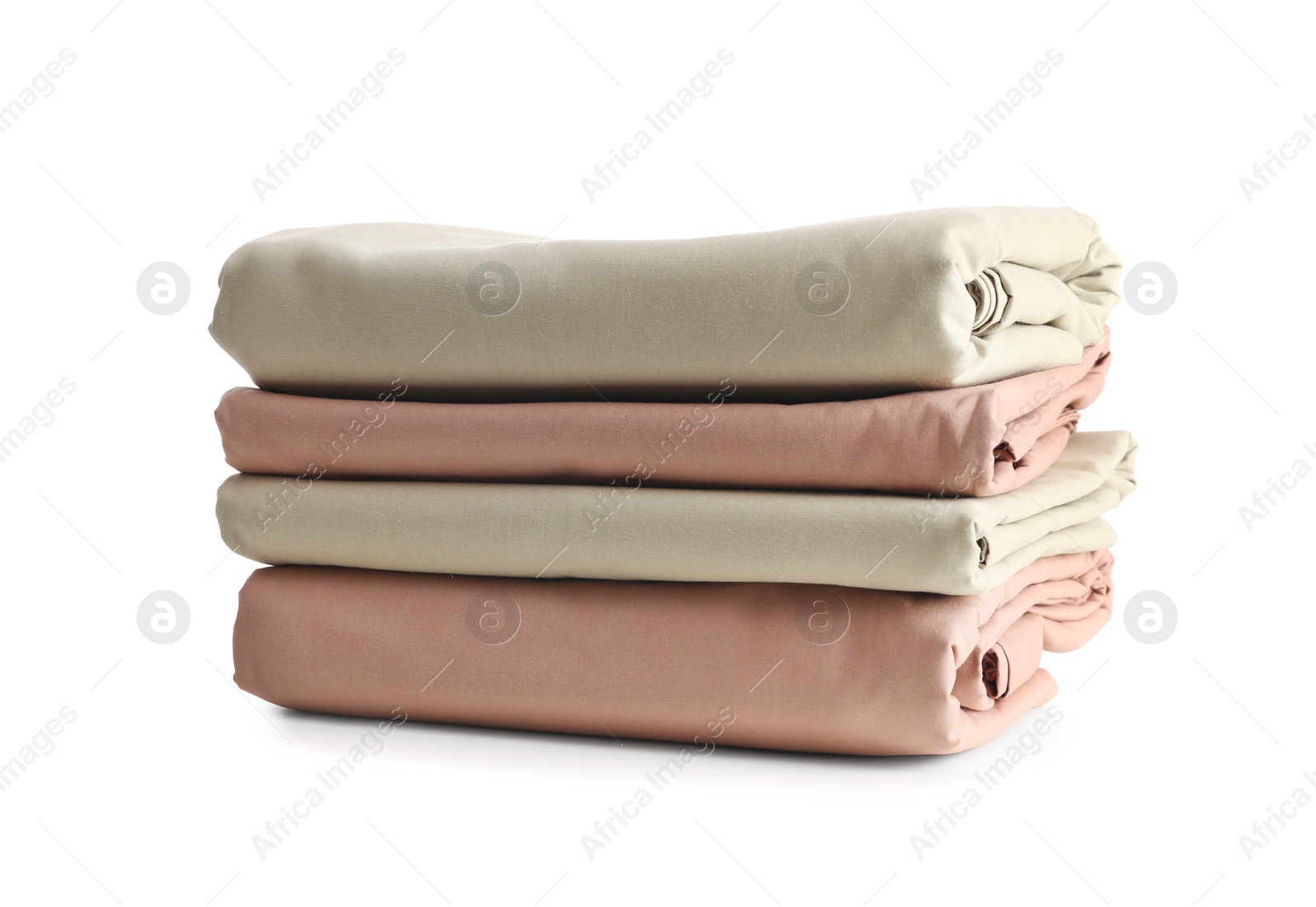 Photo of Stack of clean bed sheets isolated on white