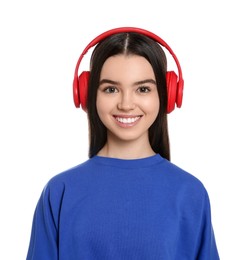 Teenage girl with headphones on white background