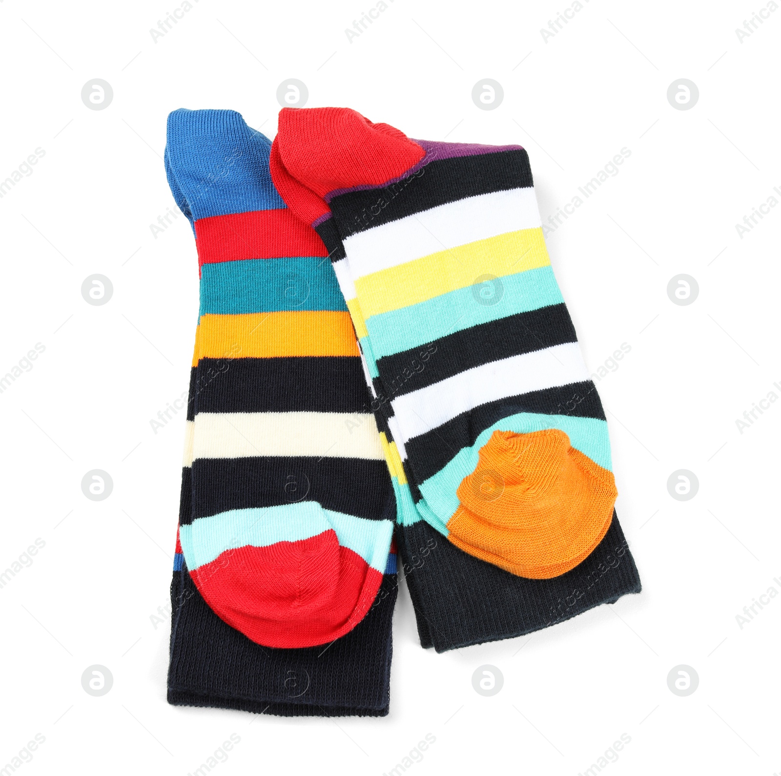 Photo of Colorful socks on white background, top view