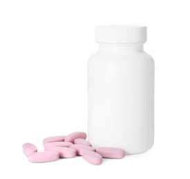 Photo of Bottle and pile of vitamin pills isolated on white