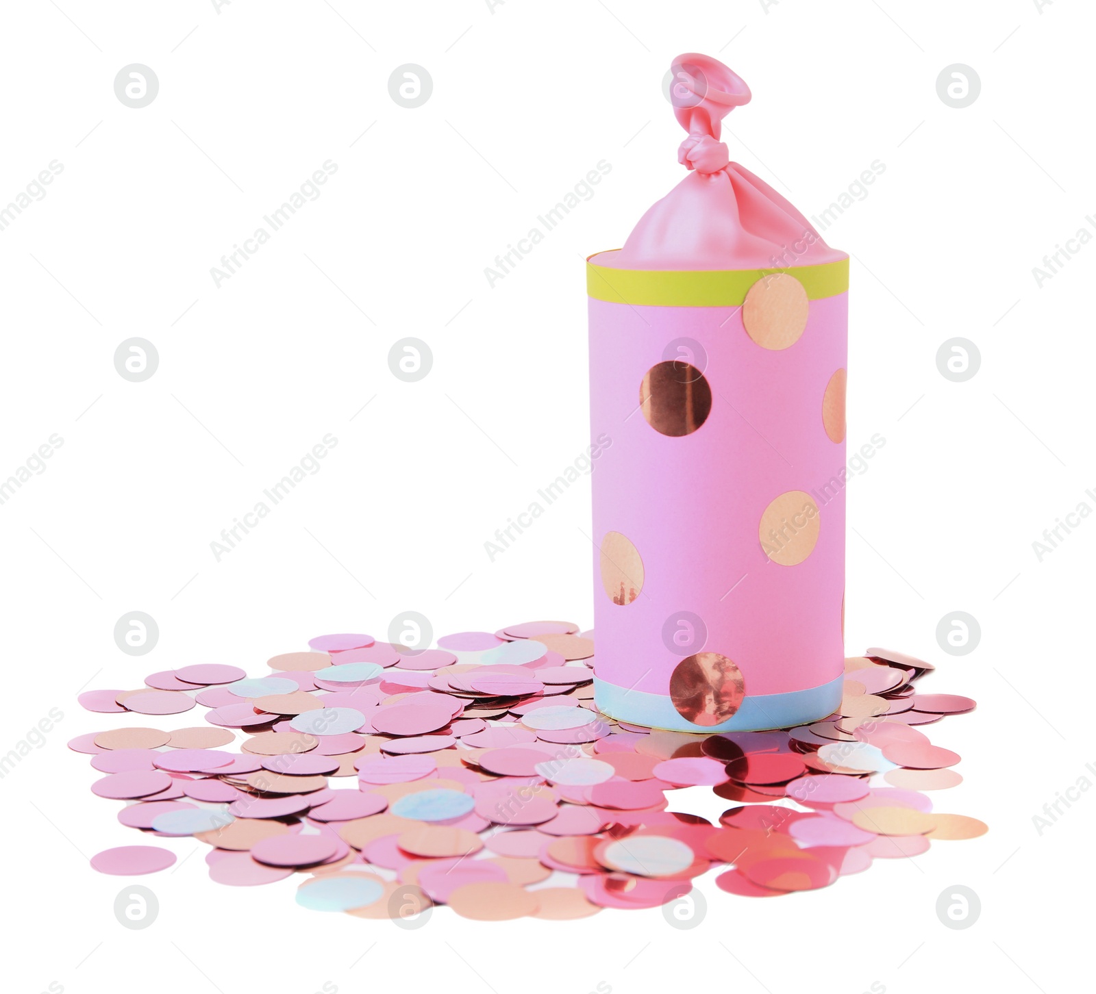 Photo of Colorful confetti with pink party cracker isolated on white