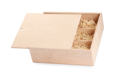 Open wooden wine box with straw isolated on white