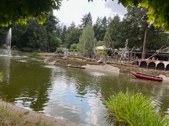 Amersfoort, the Netherlands - August 20, 2022: Beautiful view of canal in DierenPark