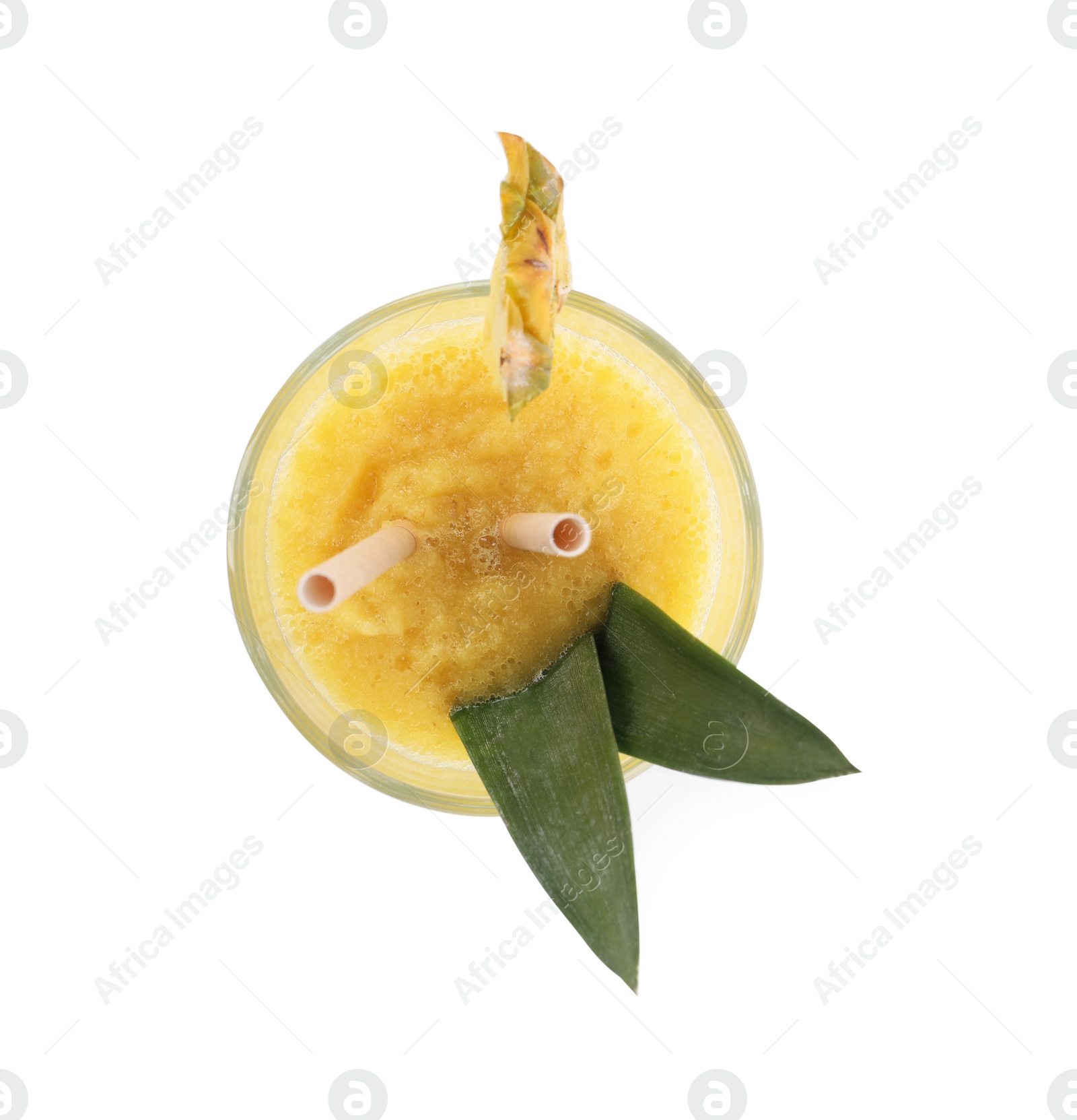 Photo of Tasty pineapple smoothie in glass isolated on white, top view