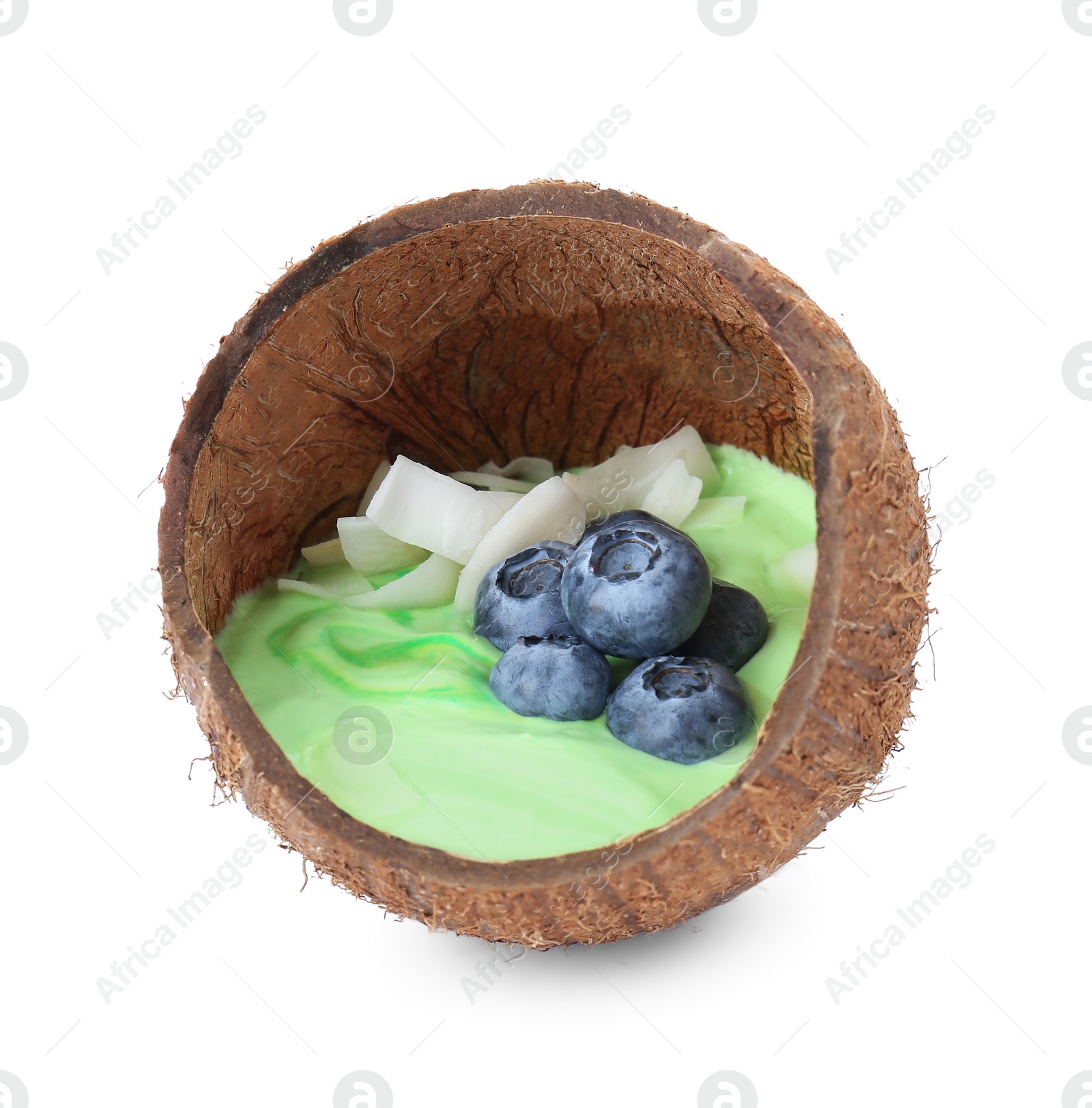 Photo of Tasty smoothie bowl with fresh blueberries in coconut shell isolated on white