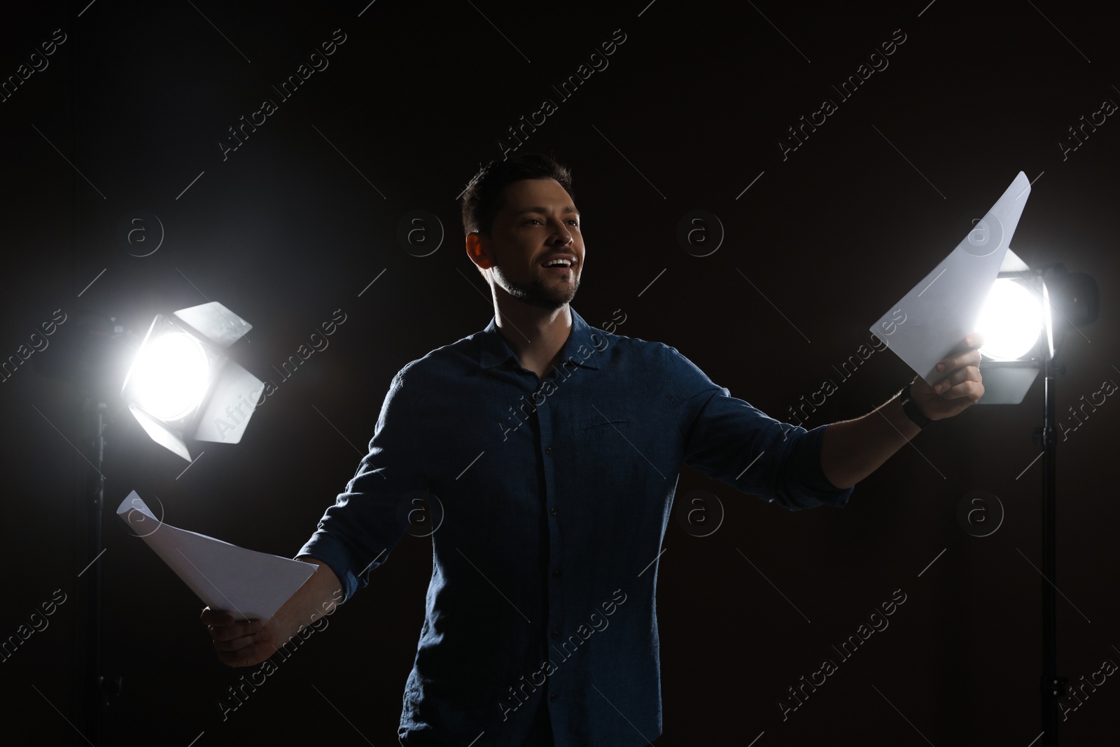 Photo of Professional actor rehearsing on stage in theatre