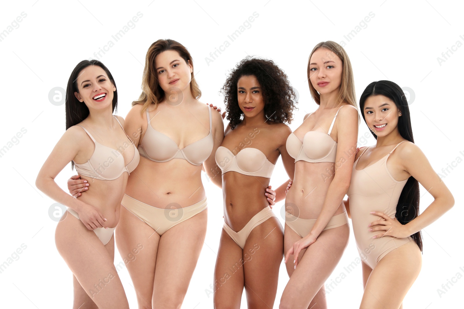 Photo of Group of women with different body types in underwear on white background