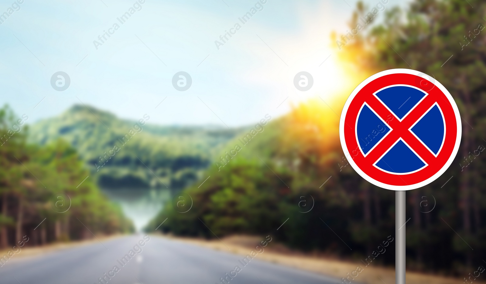 Image of No Stopping road sign on highway, space for text