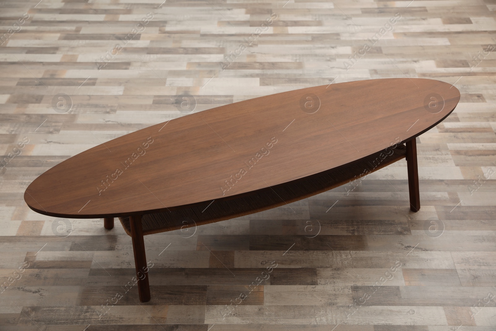 Photo of Stylish empty wooden table indoors. Interior element