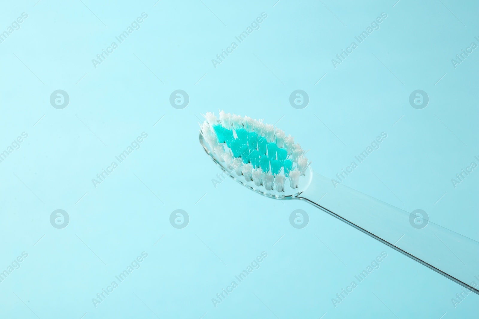 Photo of Manual toothbrush on color background. Dental care