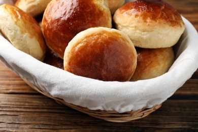 Tasty scones prepared on soda water on wooden table, closeup