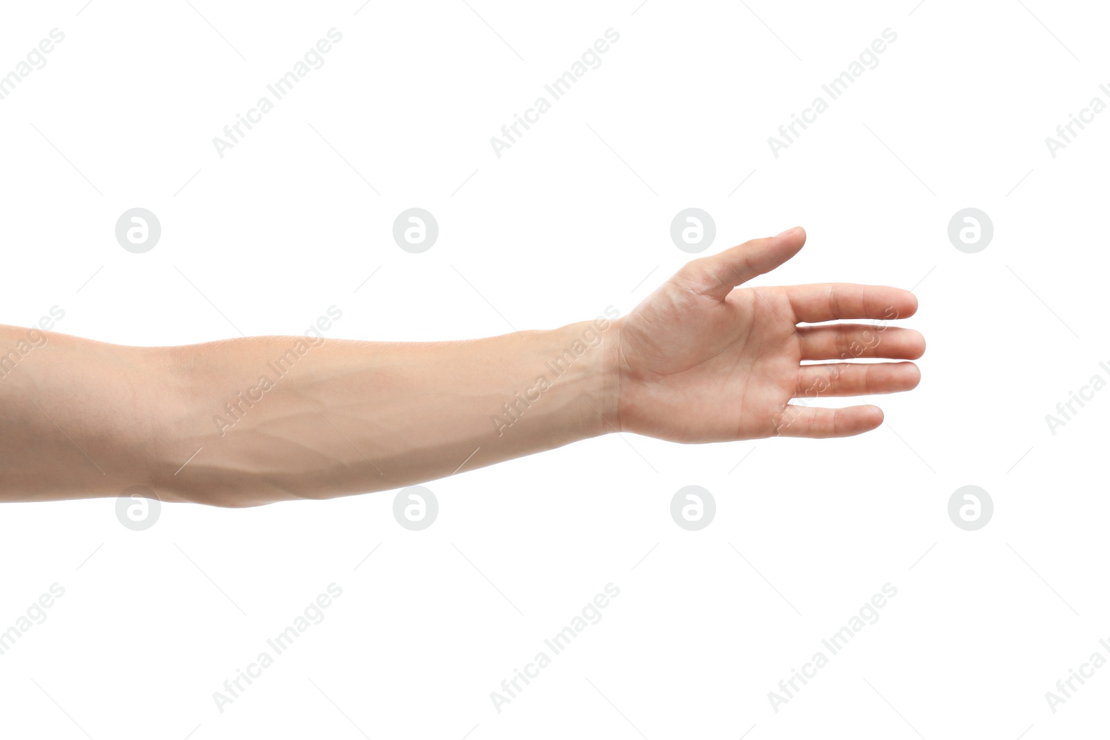 Photo of Young man held out hand on white background, closeup