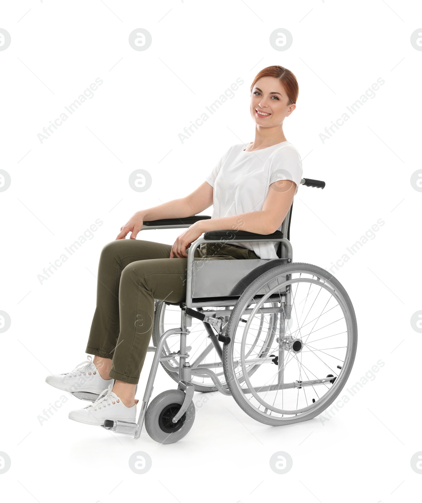 Photo of Beautiful woman in wheelchair isolated on white