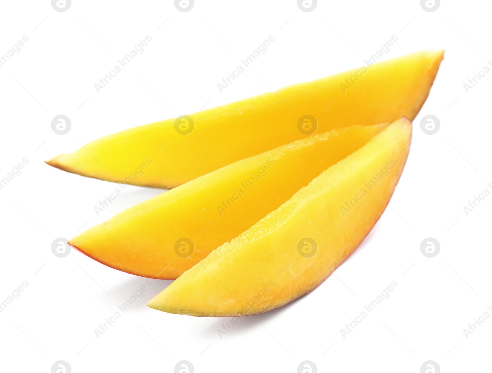 Photo of Slices of delicious ripe mango on white background