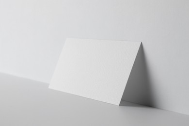 Photo of Blank business card on white background. Mockup for design